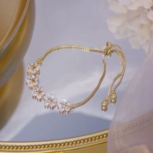 Ladies 14 karat Flower bracelet CZ